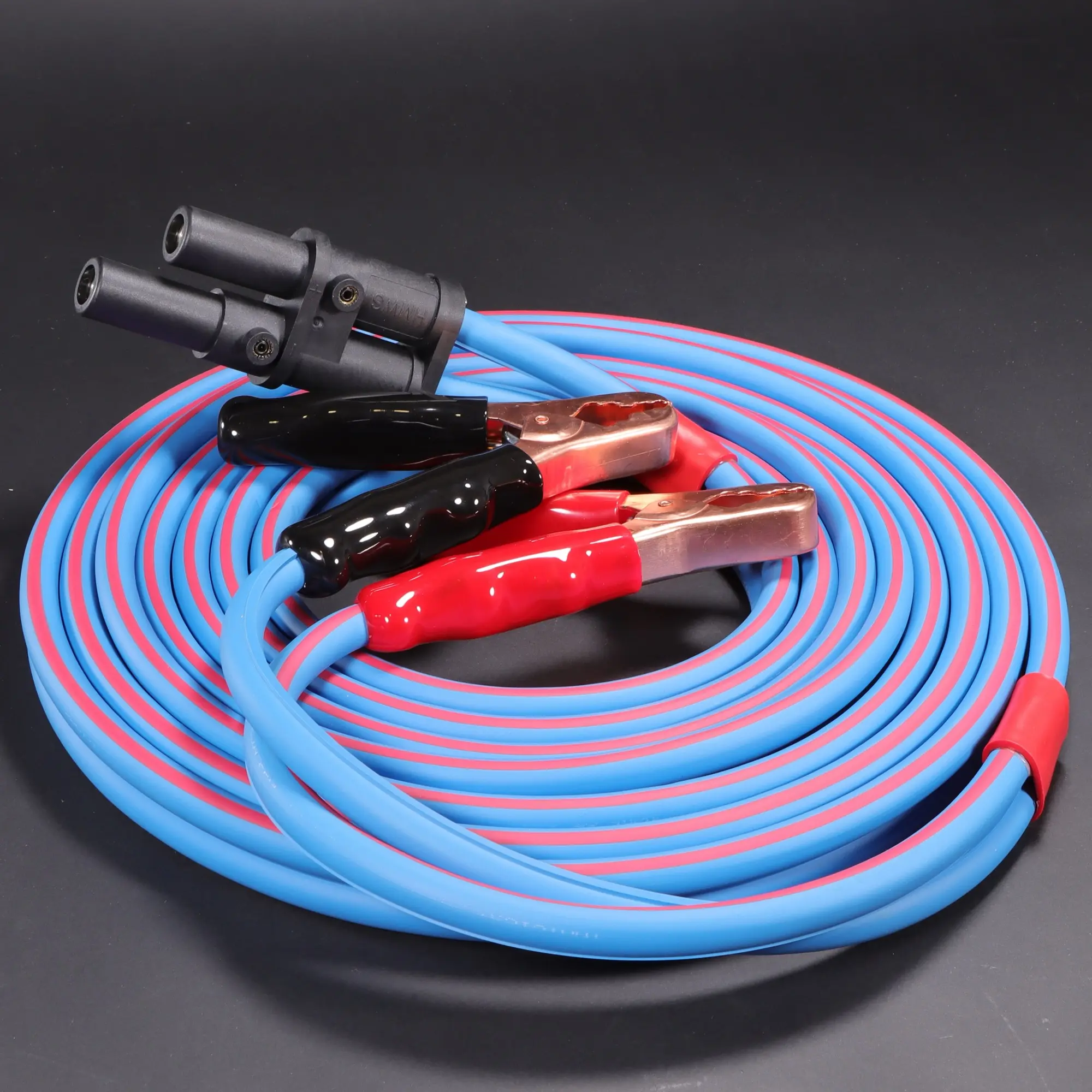 Heavy Equipment jumper cables, with 400amp to 1000amp clamps, J1283 Jump Start Plugs, and more. Decorative Image.