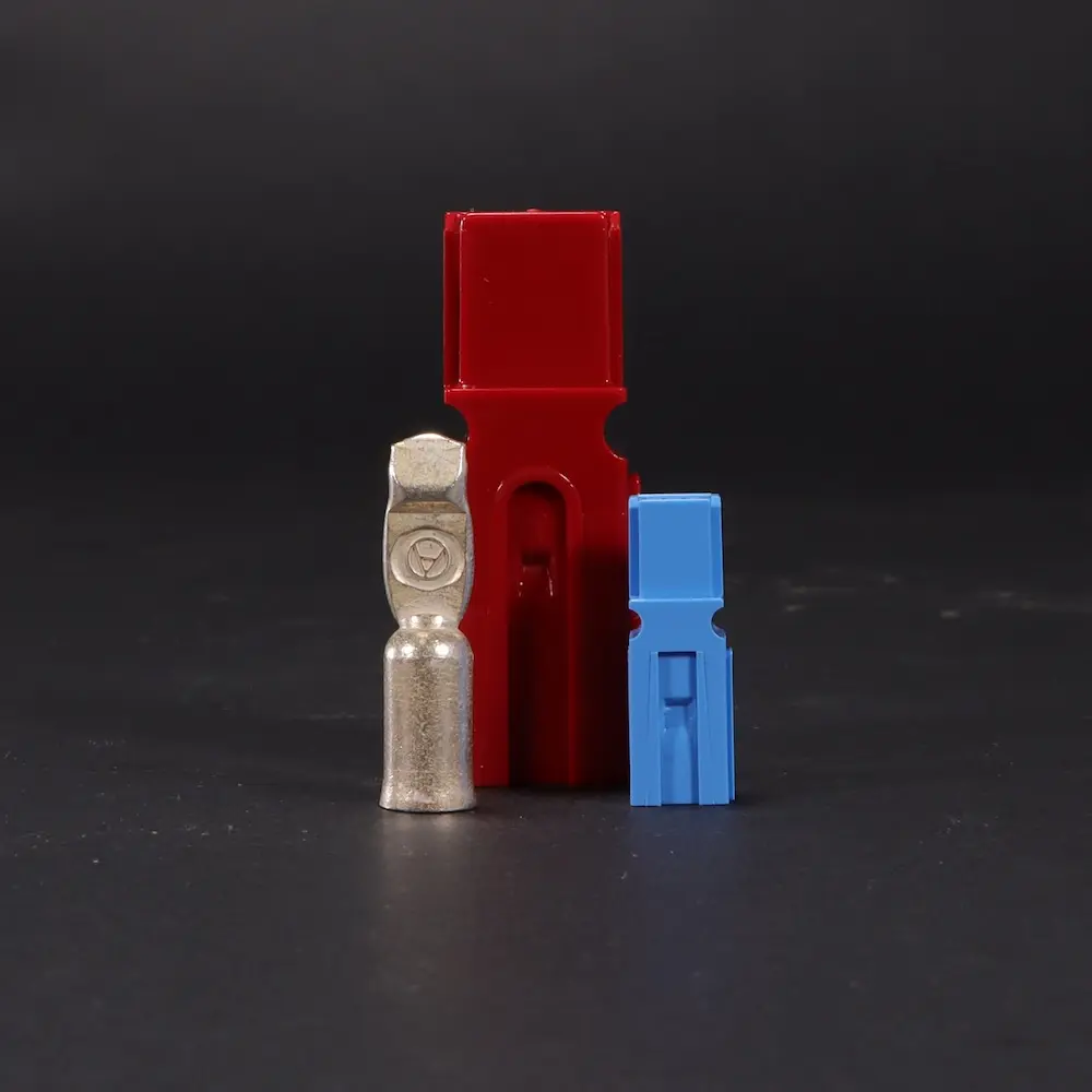 Power Poles & Pins Decorative Image; black background, blue and red connectors with a mini tip