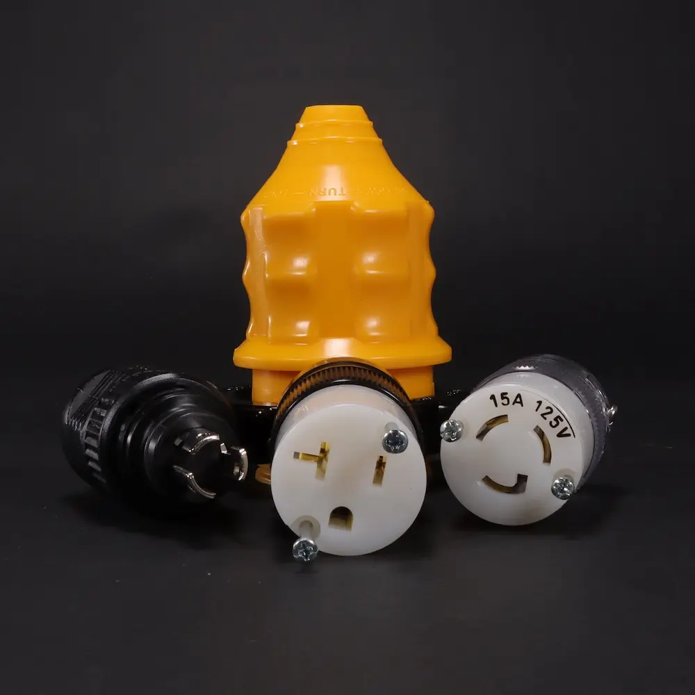 DC and AC dtyle plugs with a DC plug cap protector in the background; Decorative Image