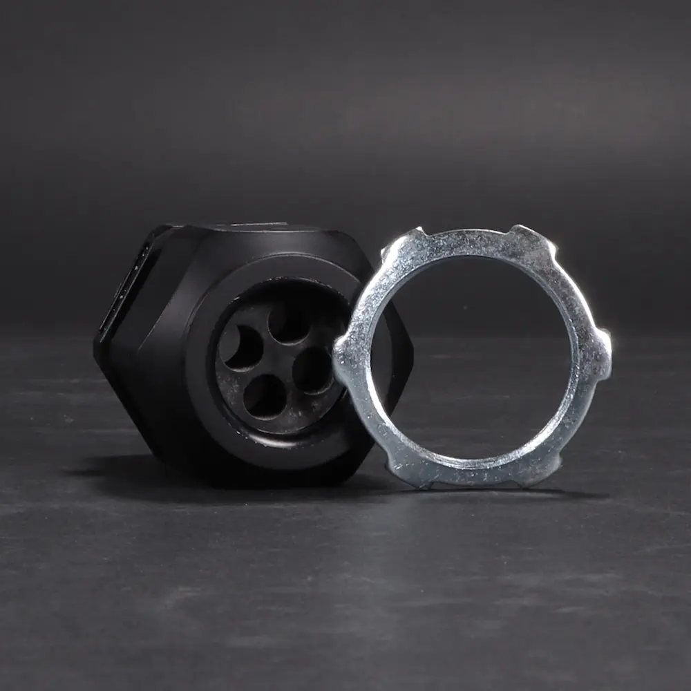 Watertight cable gland with washer placed on a black background; Decorative Image